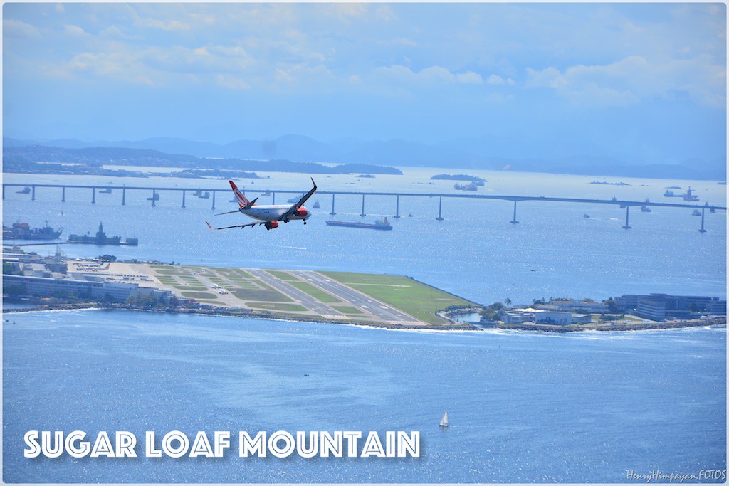 Plane Spotter mode. The Sugar Loaf Mountain is a good venue for plane spotters taking shots with the airplane taking off or landing at Santos Dumont Airport
