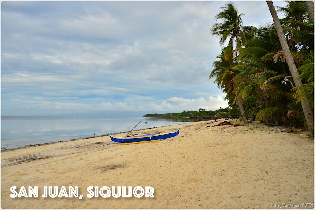 early morning walk at the beach in San Juan, Siquijor