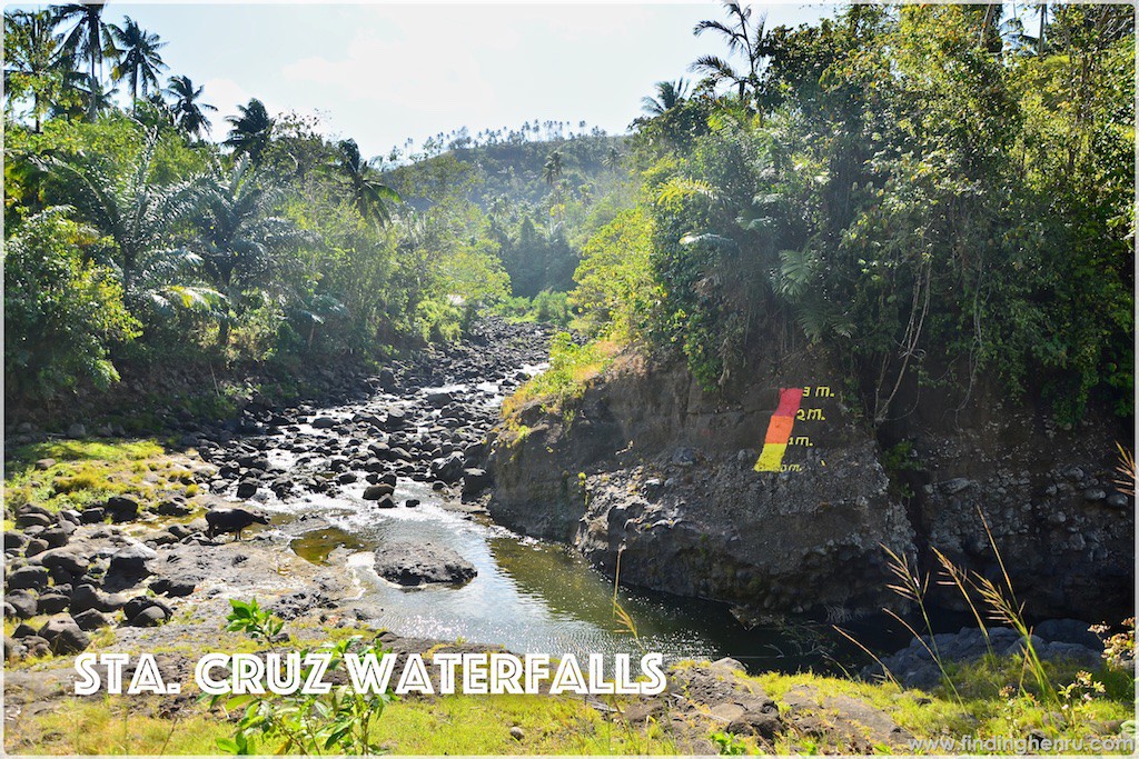 the Sta Cruz River and its water level marker