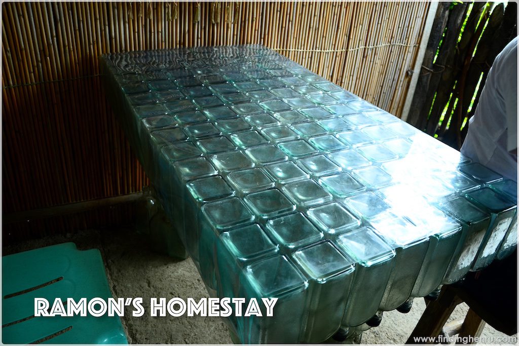 i am amazed with this table made up of empty gin bottles