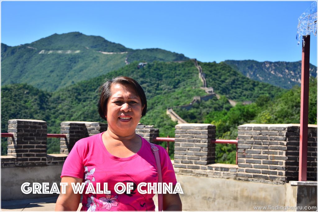 my mom having the Great Wall as background